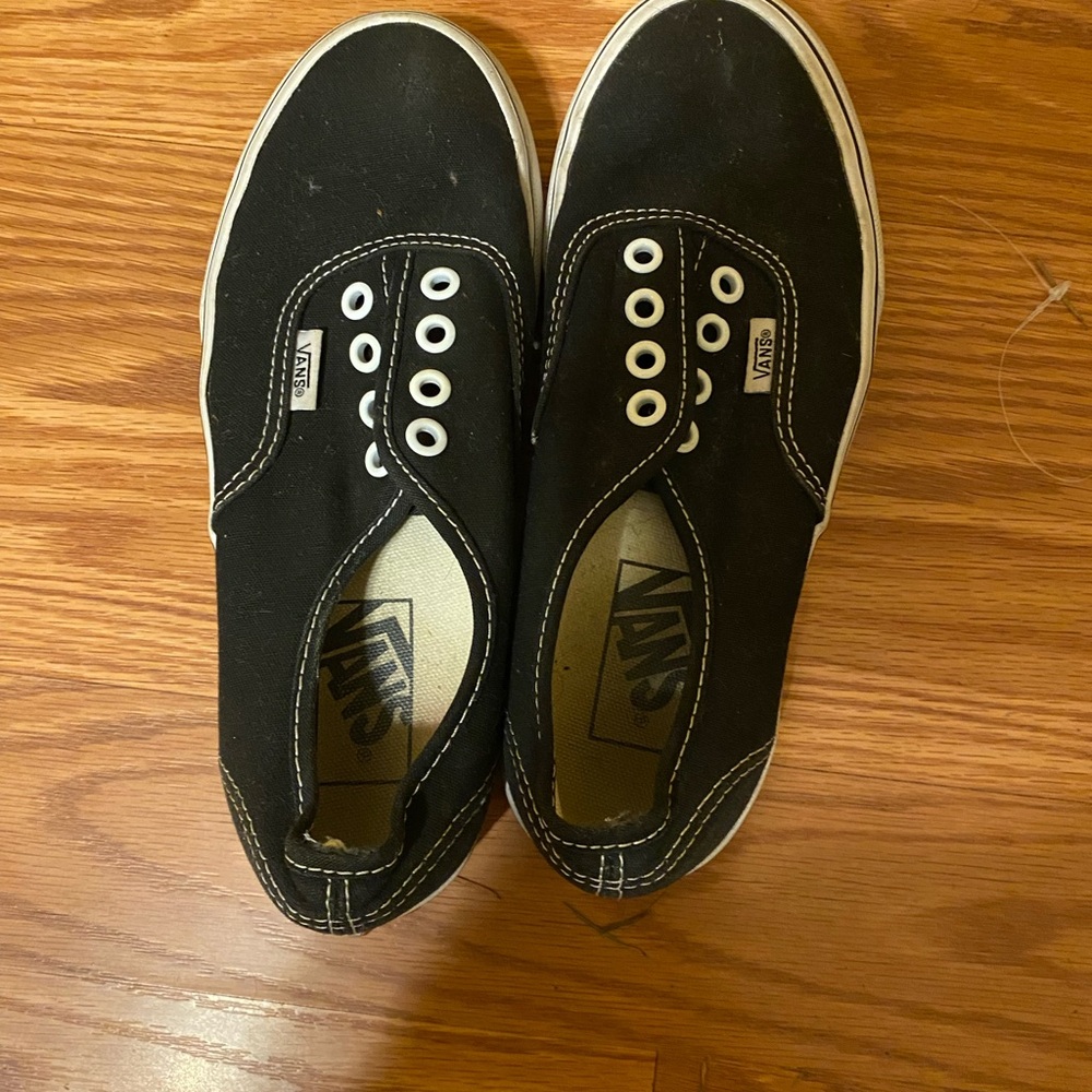 Vans Black Canvas Slip-Ons